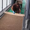 Epoxyfloor with gravel is levelled by hand